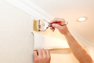 Pose de papier peint à Bessens — revêtements muraux et toiles de verre